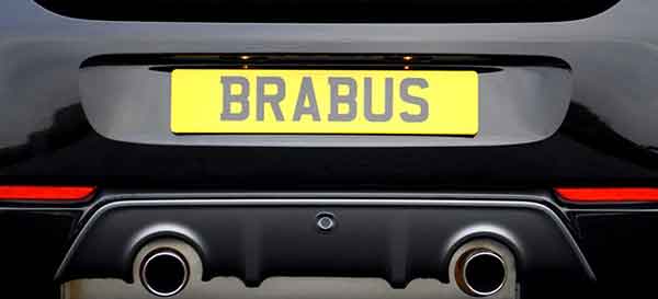number plate on the back of a car that spells BRABUS